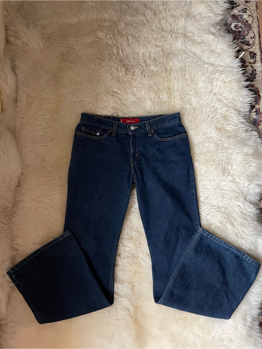 Vintage rare Levi’s 514 Superlow rise dark wash denim flared bootcut jeans